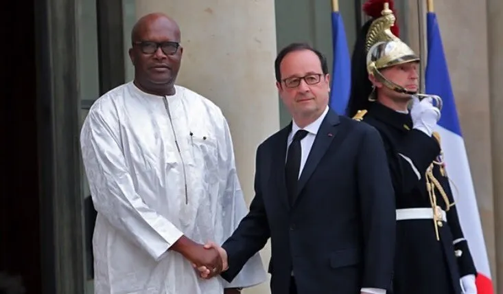 الرئيسان الفرنسي افرانسوا هولاند والبوركيني روك مارك اكريستيان كاب?