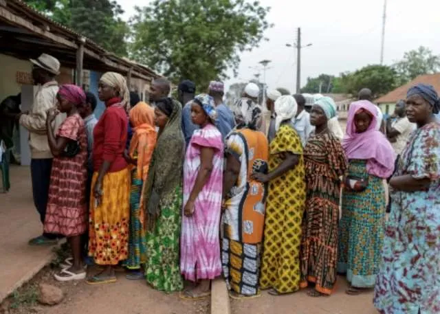 afp_voters_queue_outside_a_polling_station